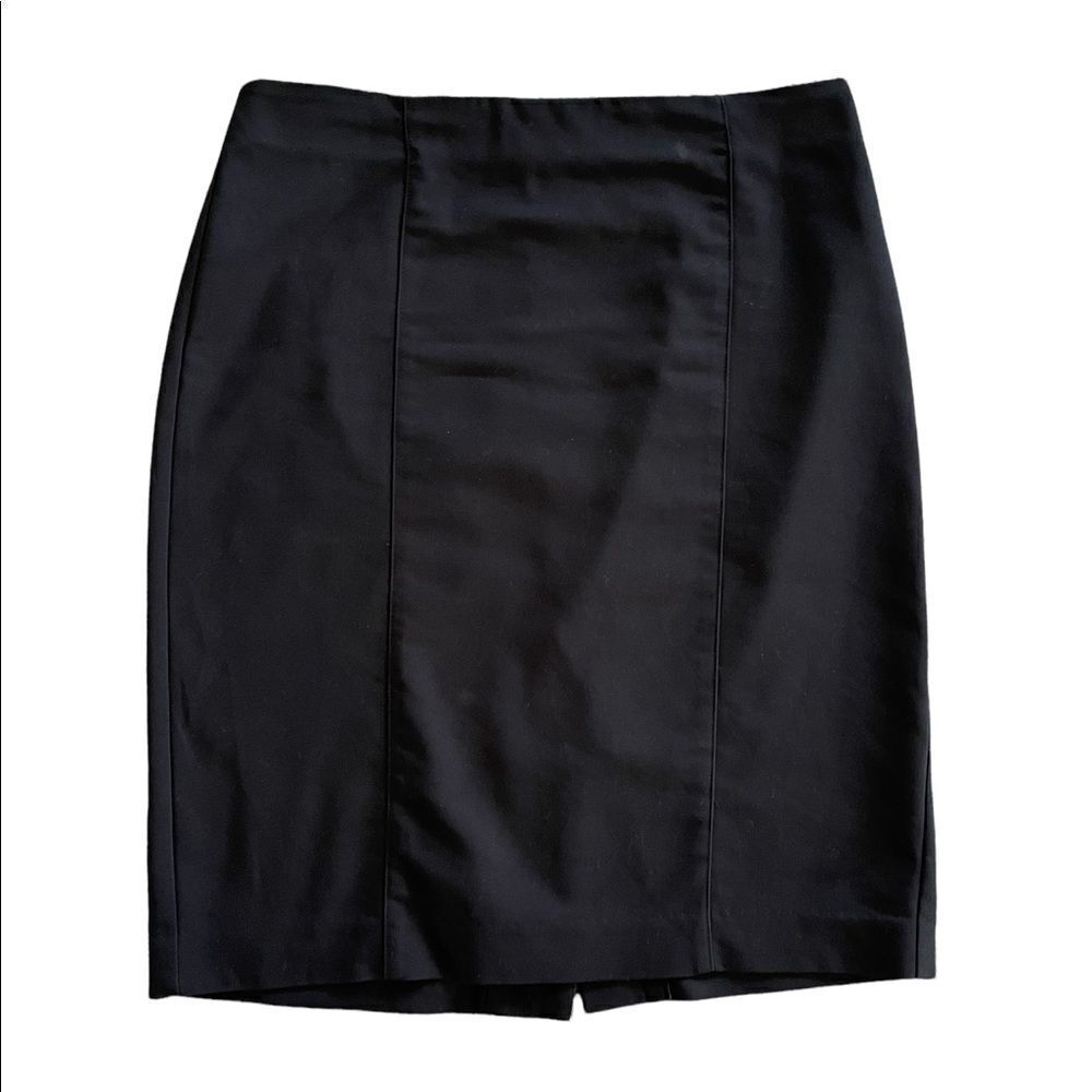 Van Heusen Stretch Extension skirt, with zip closer & back slit.